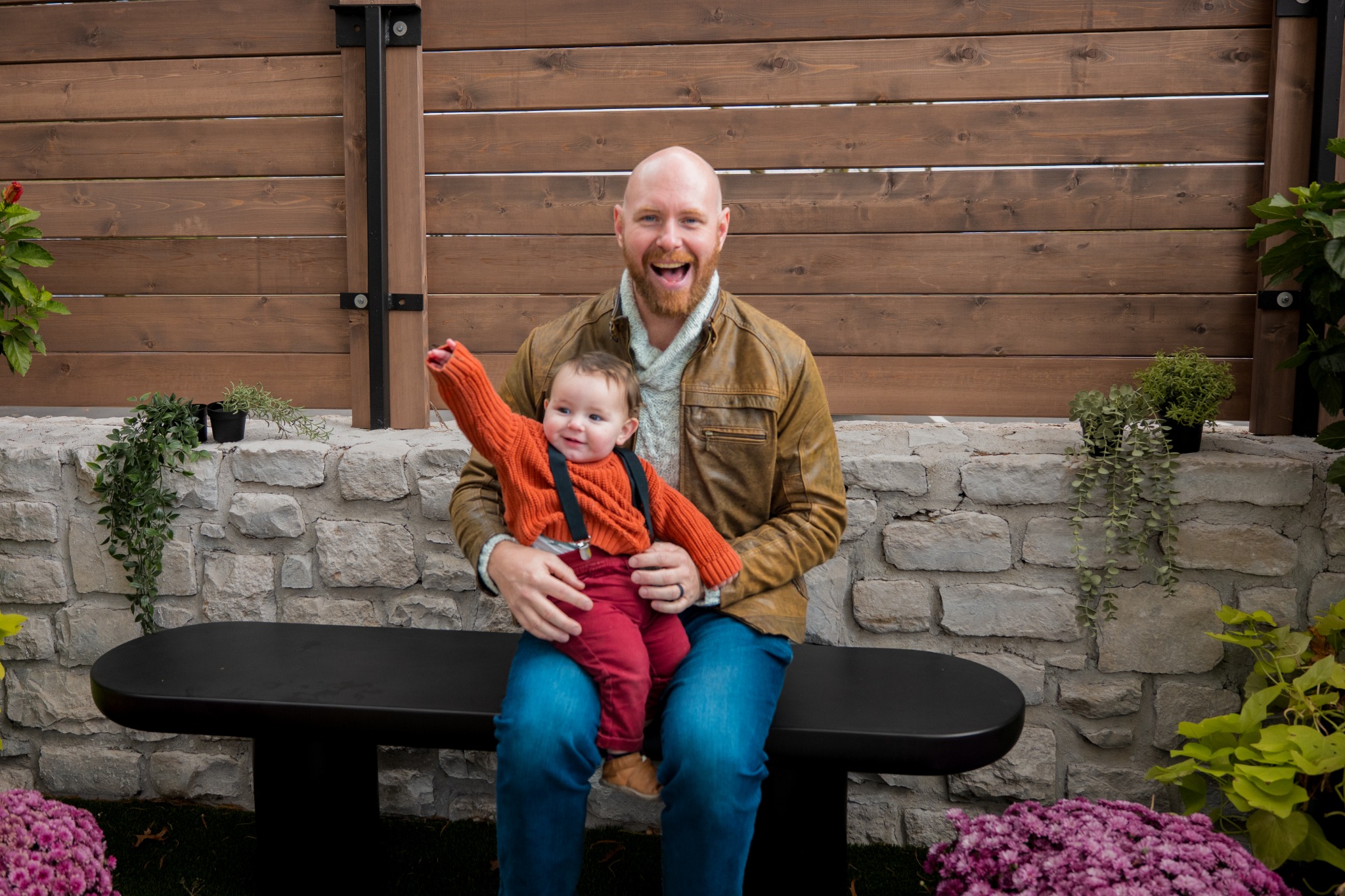 A father and child enjoying their family portrait session
